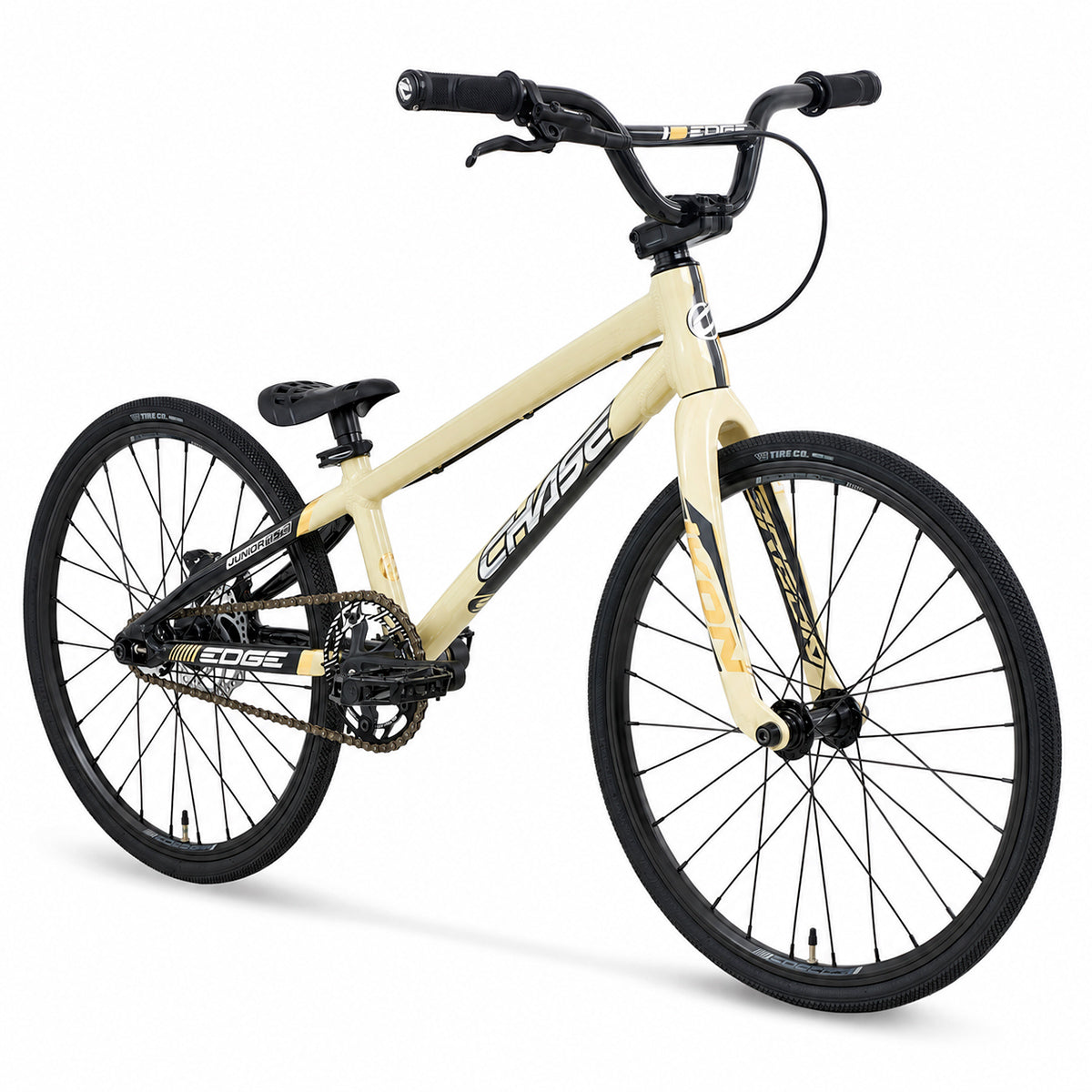 A beige Chase Edge Junior CF Race Bike (2027) is displayed on a white background, featuring a carbon fork, black handlebars, seat, and tires. The bike showcases “Chase” branding and is designed with a lightweight frame and thin, knobby tires ideal for BMX racing.