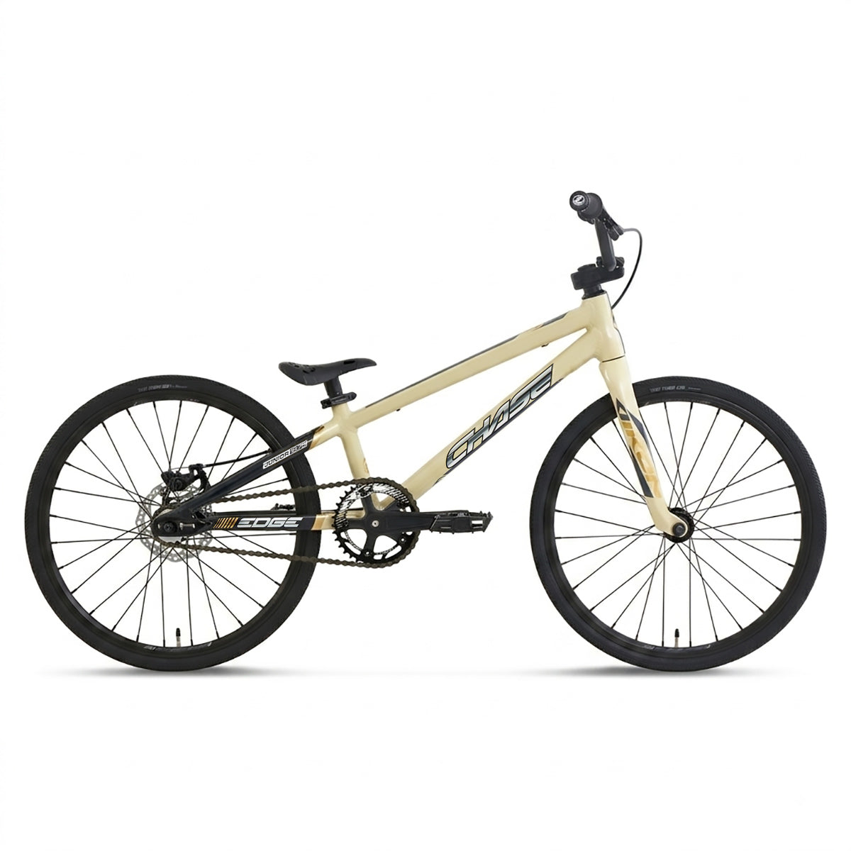 Side view of a beige Chase Edge Junior CF Race Bike (2027) with black wheels, straight handlebars, a carbon fork, and “Chase” branding on the frame.