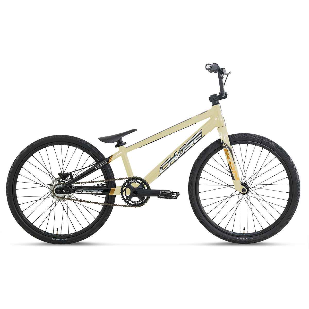 A Chase Edge Pro Cruiser CF Race Bike (2027) in beige, featuring black wheels, a carbon fork, flat pedals, and a minimalist frame design, is displayed in profile against a white background.