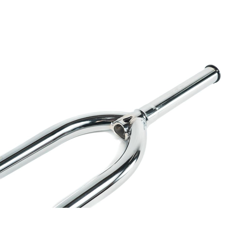 Close-up view of Colony Cadet 18 Inch Forks, crafted from heat-treated CrMo with a straight steerer tube and welded joints, isolated on a white background.