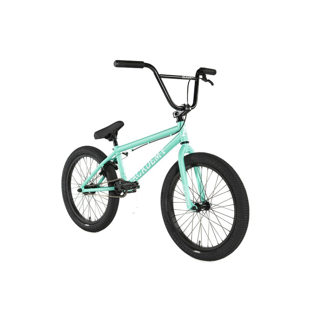 The Academy Trooper 20 Inch Bike in teal features black handlebars, pedals, and tires. Shown angled on a white background, it’s an ideal choice for beginner BMX riders.