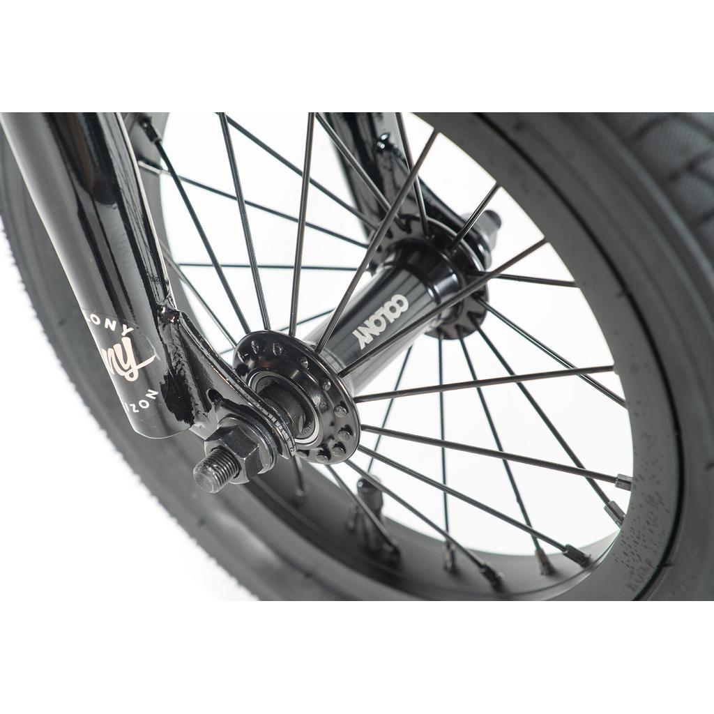 Close-up of the Colony Horizon 12 Inch Bike’s front wheel hub and spokes with black fork and tire, showcasing Colony Horizon branding—emphasizing its lightweight alloy frame for enhanced performance.
