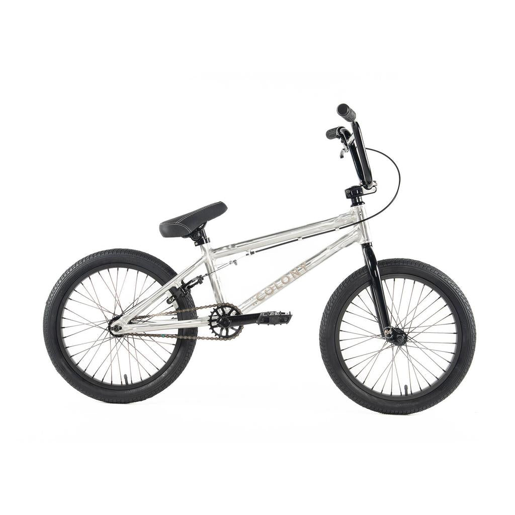 The Colony Horizon 18 Inch Bike, featuring a transparent frame with black handlebars, seat, and tires, is displayed in profile against a white background.