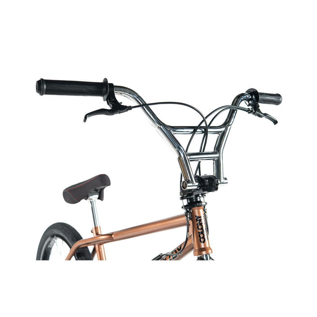 Close-up of the Colony Prody Elite 20 Inch Bike's handlebars, brake lever, seat, and strong CrMo frame, with the "Colony" brand featured on the front.