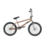 A brown Colony Prody Elite 20 Inch BMX bike with a CrMo frame, black tires and seat, and chrome handlebars is shown in side profile on a white background.