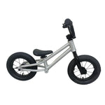 The Colony BMX Horizon Alloy Balance Bike is a small, silver and black pedal-free bike designed for young children to experience their first kids BMX ride.