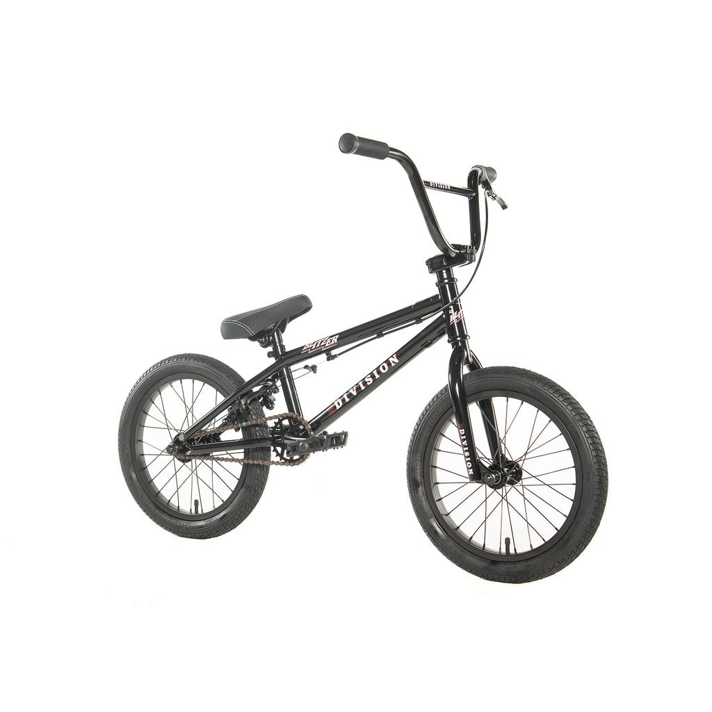 The Division Blitzer 16 Inch Bike is an entry-level BMX with scaled-down geometry, showcasing a striking design that includes thick tires and a high handlebar, elegantly displayed from the side on a white background.