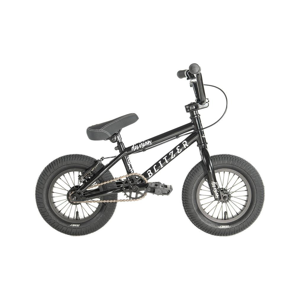 The Division Blitzer 12 Inch Bike is a small black BMX with thick tires and bold white "BLITZER" branding on the frame, shown in profile against a white background. Ideal for kids and beginner or aspiring freestyle BMX riders.