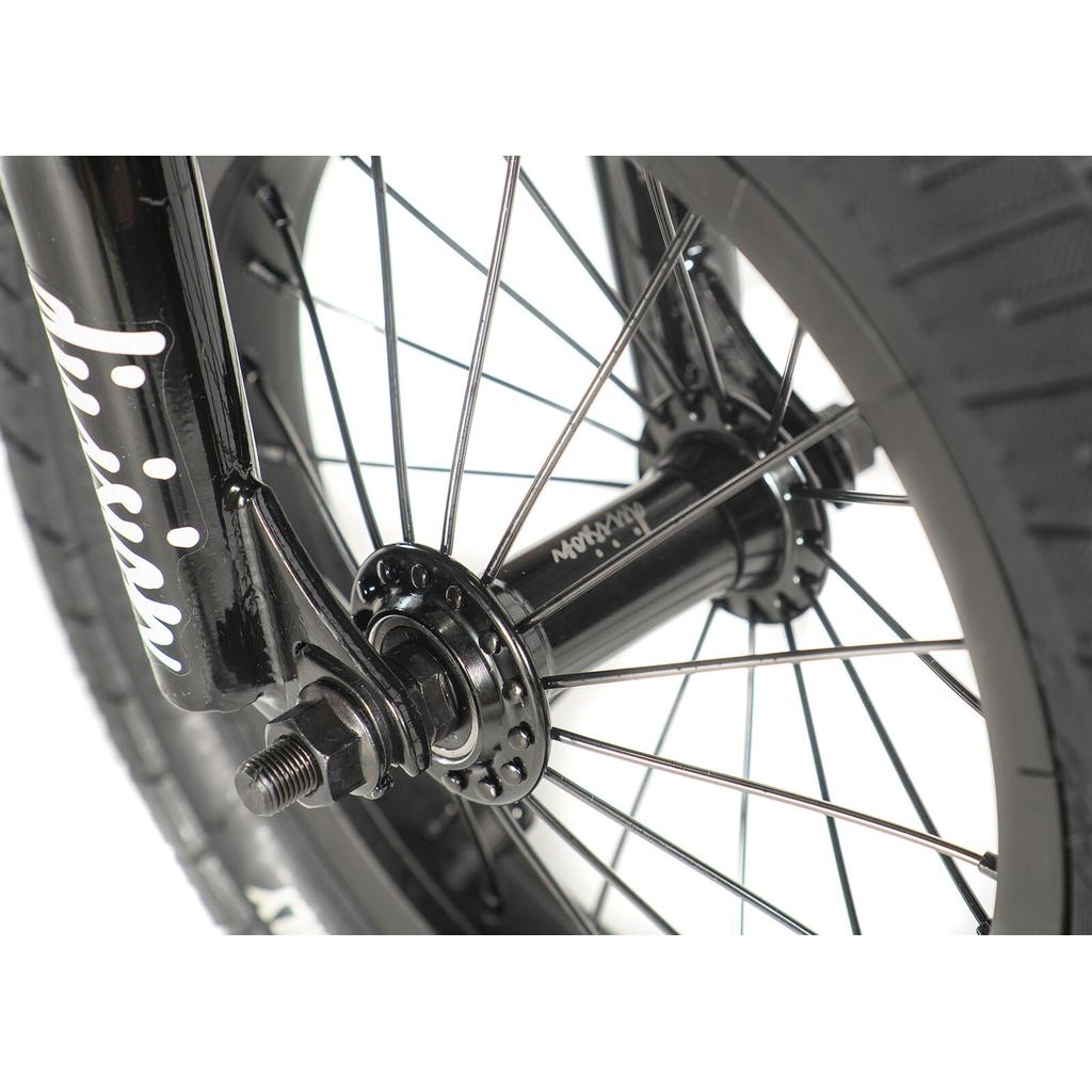 Close-up view of the Division Blitzer 12 Inch Bike's front wheel hub, showing spokes, axle nut, tire, and fork—ideal for kids' BMX or freestyle BMX riding.