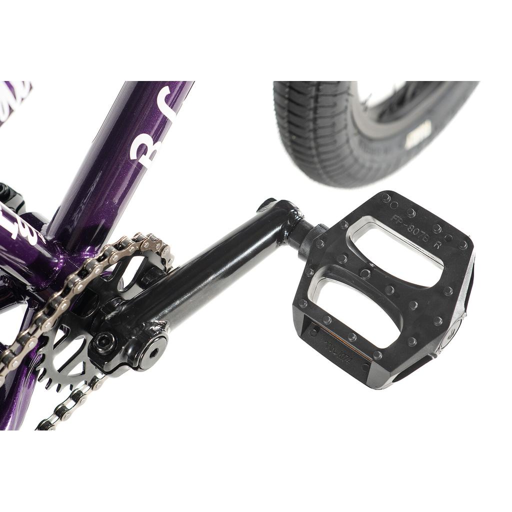 Close-up view of the Division Blitzer 14 Inch Bike's black BMX pedal, crank arm, chainring, and part of the frame and rear wheel against a white background.