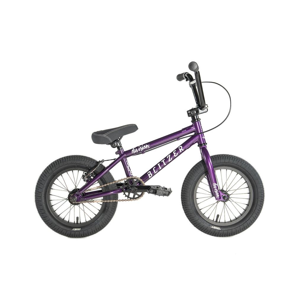 The Division Blitzer 14 Inch Bike is a purple kids' BMX with black handlebars, seat, and thick tires, displayed in profile view against a white background.