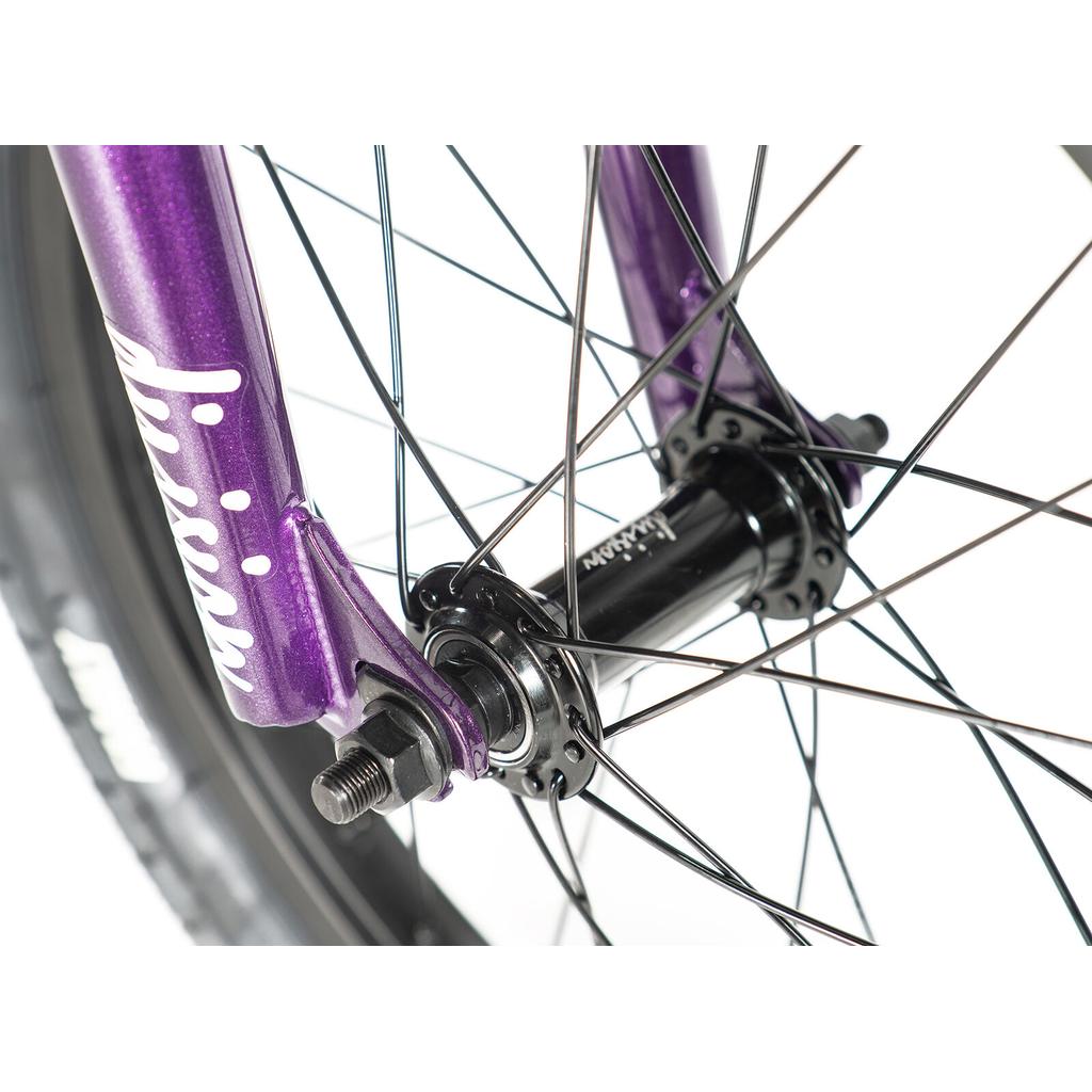 Close-up view of a purple kids BMX fork and black hub with spokes on the front wheel, designed for the Division Blitzer 16 Inch Bike.