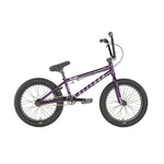 The Division Blitzer 18 Inch Bike, shown in purple with black tires, a padded seat, and "BELIZER" on the frame, is ideal for beginners or kids learning BMX. Side view on white background.