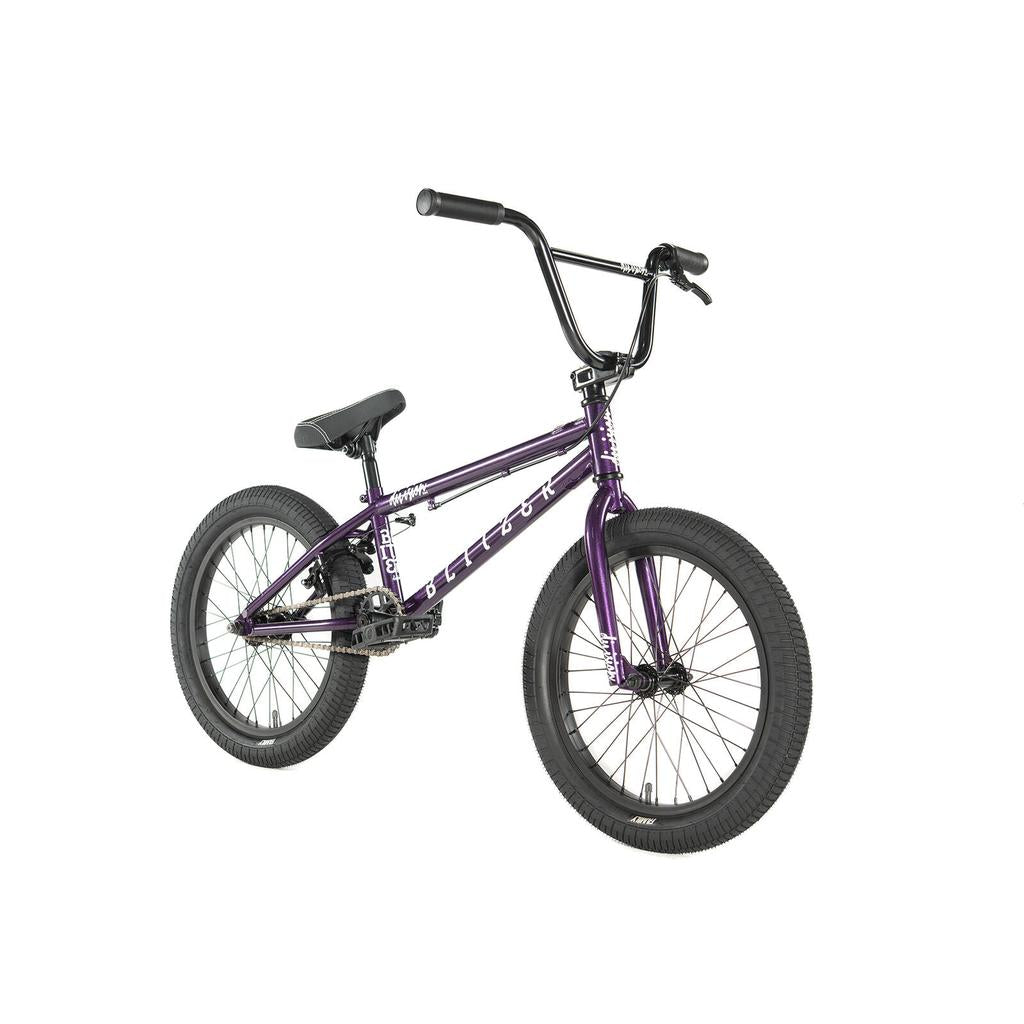 The Division Blitzer 18 Inch Bike features a purple Hi-Ten frame with black handlebars, seat, pedals, and tires, displayed against a white background.