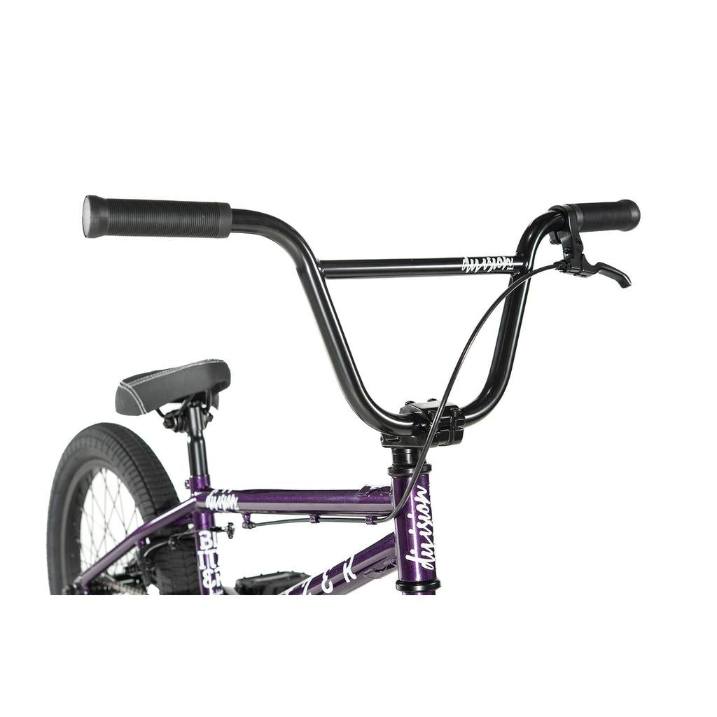 Close-up of the handlebars, seat, and front section of the Division Blitzer 18 Inch Bike, featuring a purple Hi-Ten frame and black grips, set against a white background.