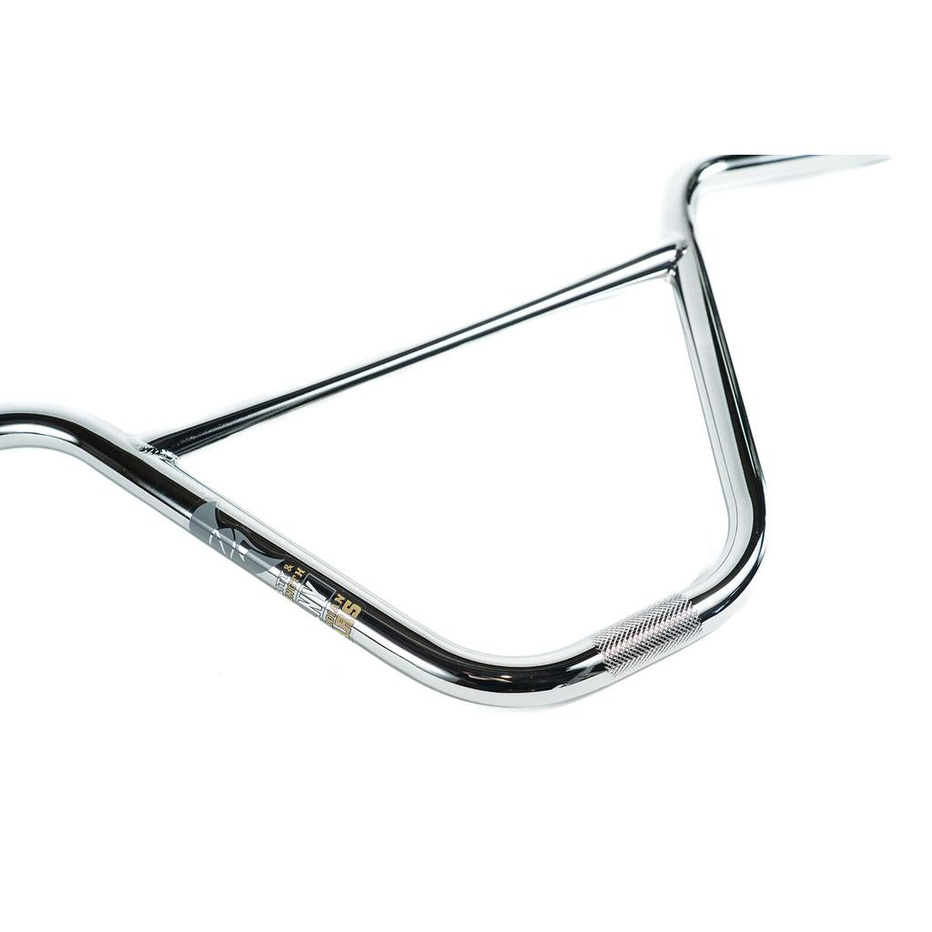 The Colony Guardian Bars BMX handlebar is made from strong 4130 chromoly, features a knurled grip area and printed branding, and is shown against a white background.