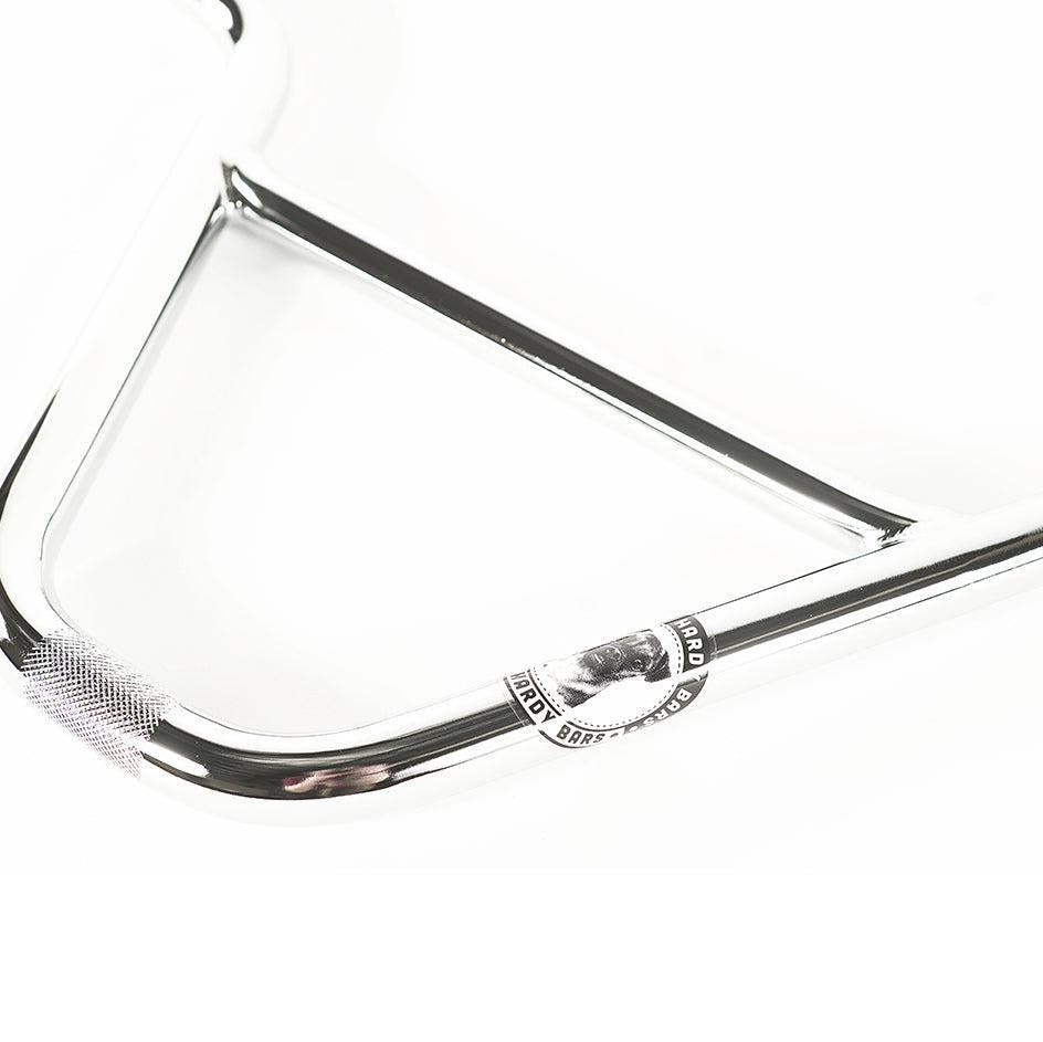 Close-up of Colony Hardy V2 Bars featuring a logo sticker and textured grip area, highlighting the stylish D shape design against a clean white background.