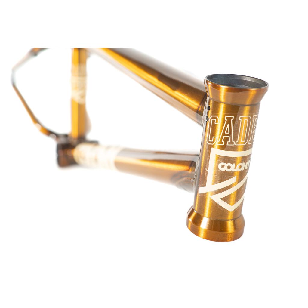 Metallic bronze Colony Cadet 18 Inch Frame head tube with “CADET” and logo branding.