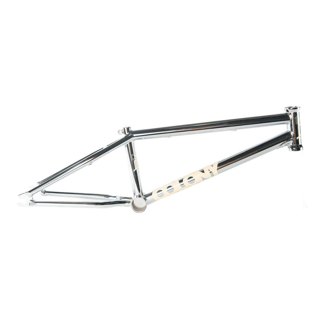 The Colony Cadet 18 Inch Frame is a chrome BMX frame with "COLONY" in white on the lower tube, made from durable chromoly. Shown on a white background.
