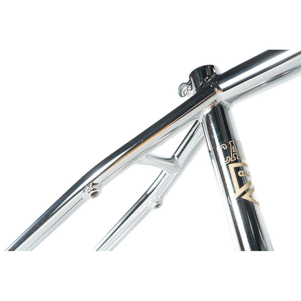 Close-up of the Colony Cadet 18 Inch Frame, showing its chrome chromoly seat tube, top tube, and part of the frame decal against a white background.