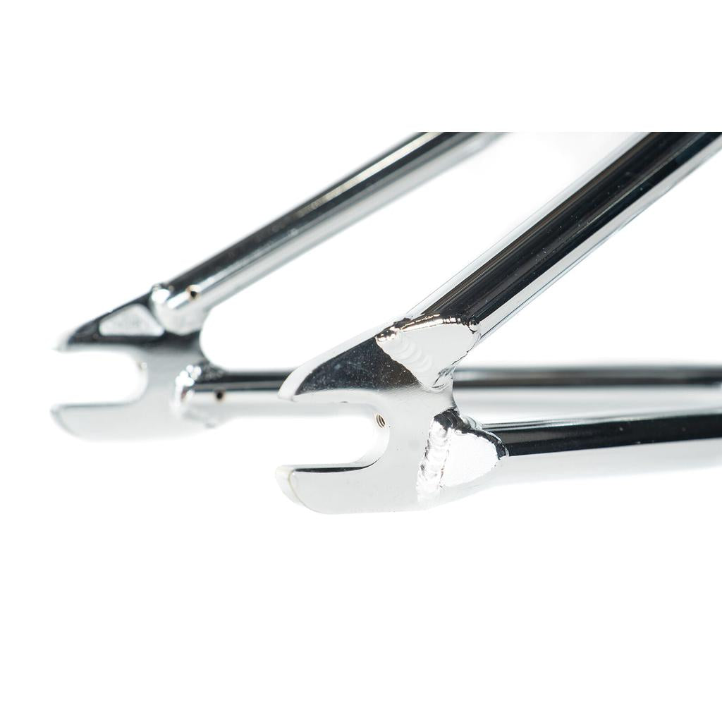 Close-up of the open ends of two shiny metal wrenches, positioned parallel against a white background—evoking the precise construction quality of the Colony Cadet 18 Inch Frame.