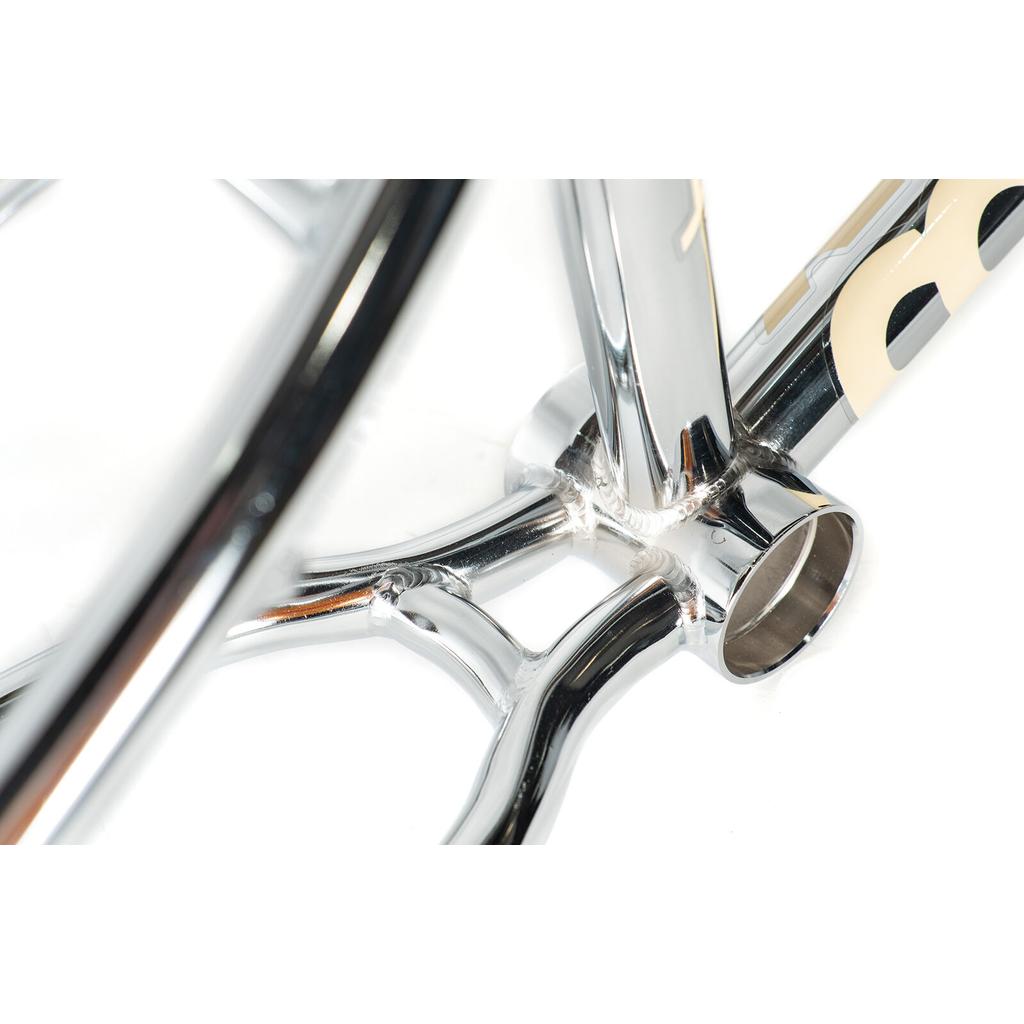 Close-up of the Colony Cadet 18 Inch Frame’s bottom bracket area, showing welded joints and sleek chromoly construction against a white background.