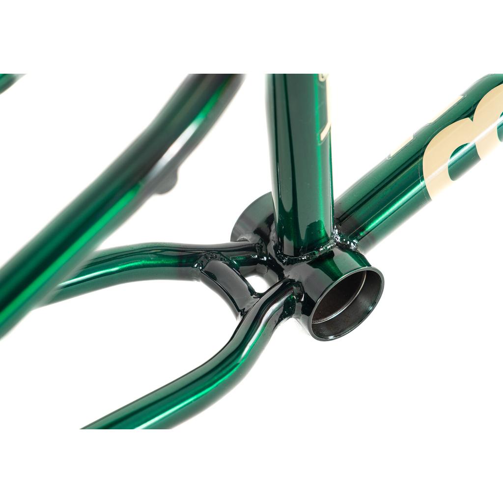Close-up of a green Colony Cadet 18 Inch Frame, focusing on the bottom bracket shell and chainstay yoke.