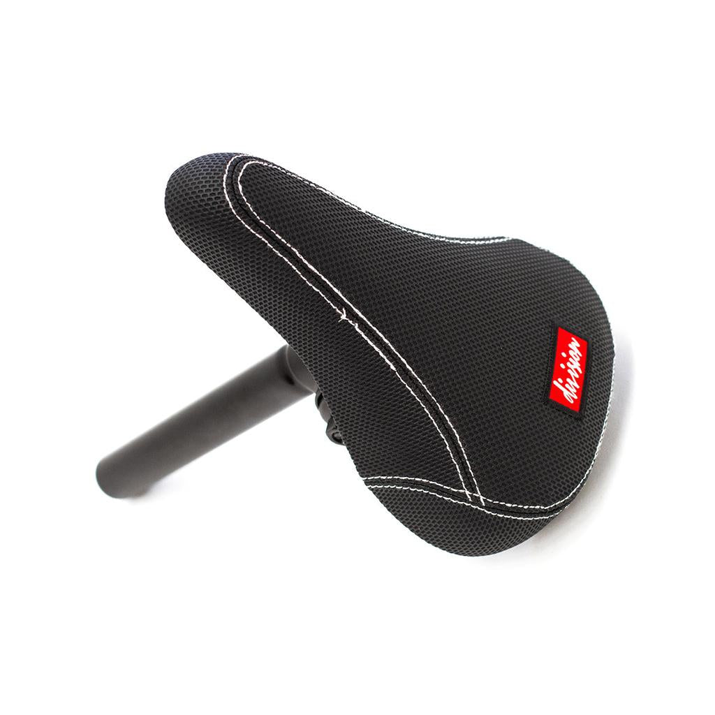 The Division Railed Seat And Post features a black BMX seat with white stitching, a textured surface, and a red Mission logo on a steel post—ideal for upgrading your Division Blitzer bike.