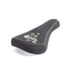 Colony Stars 2005 Mid Pivotal Seat: mid-sized BMX seat with reissue-inspired star designs, yellow stitching, and "Colony" embroidered in white on the rear, photographed on a white background.