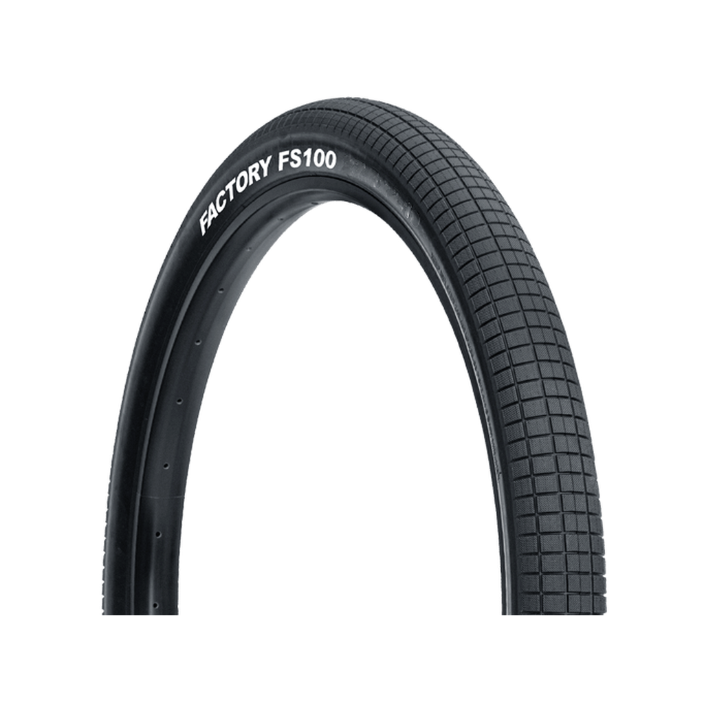 Close-up of a Tioga FS100 29 Inch Tyre labeled "FS100" with a textured tread pattern, isolated on a white background.