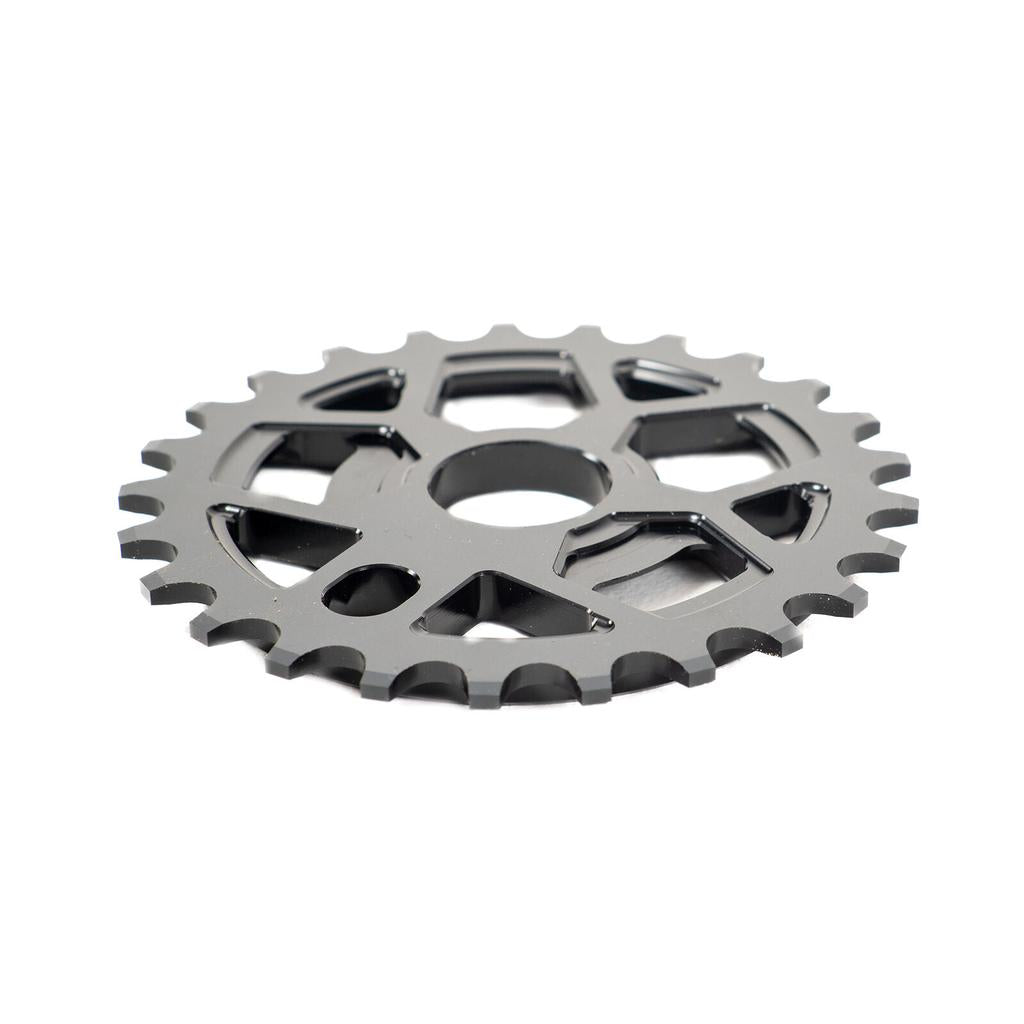 The Colony RS6 Sprocket is a black metal BMX sprocket featuring a cutout design and multiple teeth, crafted from high-strength 7075T6 alloy, displayed on a white background.