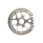 The CNC machined Colony Bish Guard Sprocket in silver showcases branded "Colony" and "BMX" engravings with a sleek guard for added protection.