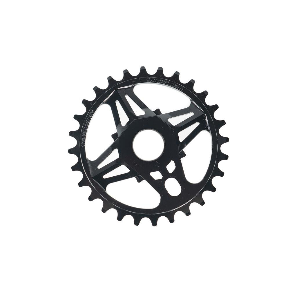 Colony CC Sprocket: Black metal BMX chainring with 28 teeth and geometric cutouts, CNC machined from 7075T6 alloy, shown on a white background.
