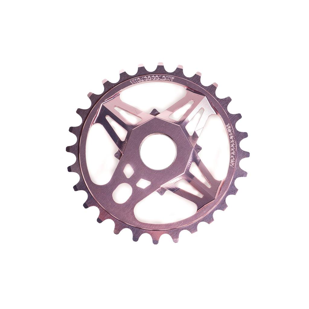The Colony CC Sprocket is a CNC machined 7075T6 alloy BMX sprocket with 28 teeth and a geometric cutout design, inspired by the Chris Courtenay Sprocket, shown against a white background.