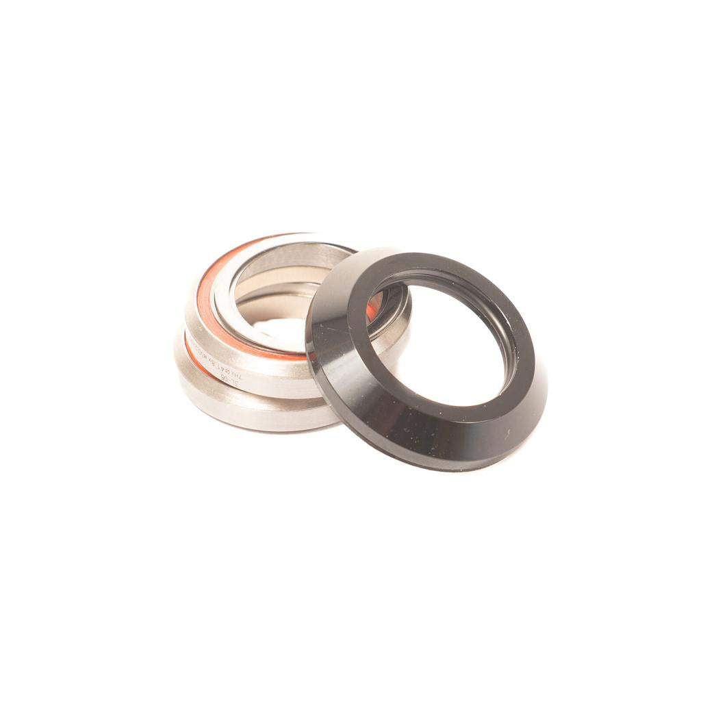 A Family Integrated Headset (1-1/8 Inch) assembly featuring a stack of metal components and a separate black tapered cover ring.