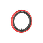 The Family F603 16 Inch Tyre is a red bicycle tire featuring a black inner tube and visible valve, shown isolated on a white background—ideal for BMX bikes and offering great value.