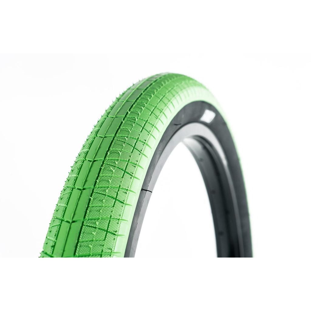 A close-up of the Family BMX F603 20 Inch Tyre with a textured green tread against a white background, highlighting this quality 20" bike tyre’s great value.