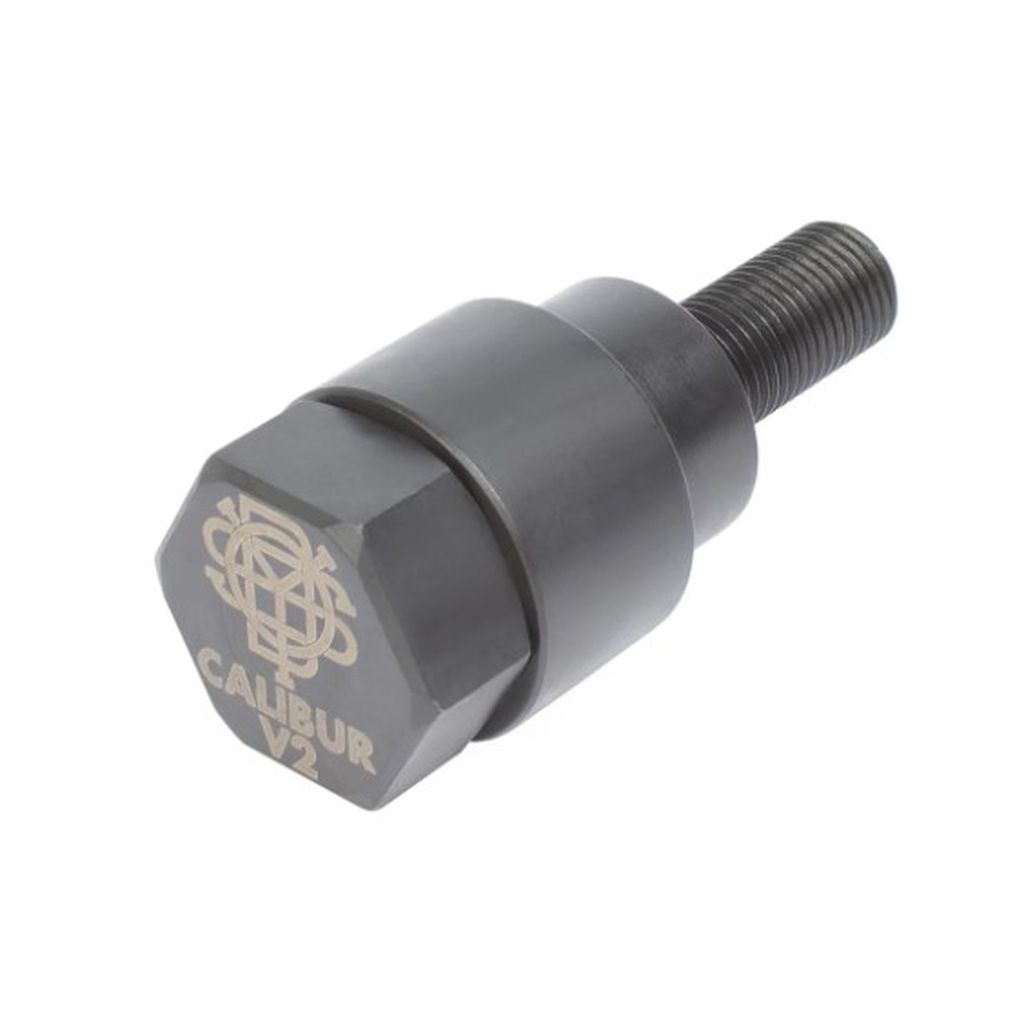 A hexagonal black metal tool listed as the Odyssey Calibur V2 Crank Installation/Removal Tool, featuring "Calibur V2" engraved on one face and a threaded M12 x 1.25 end, isolated against a white background.