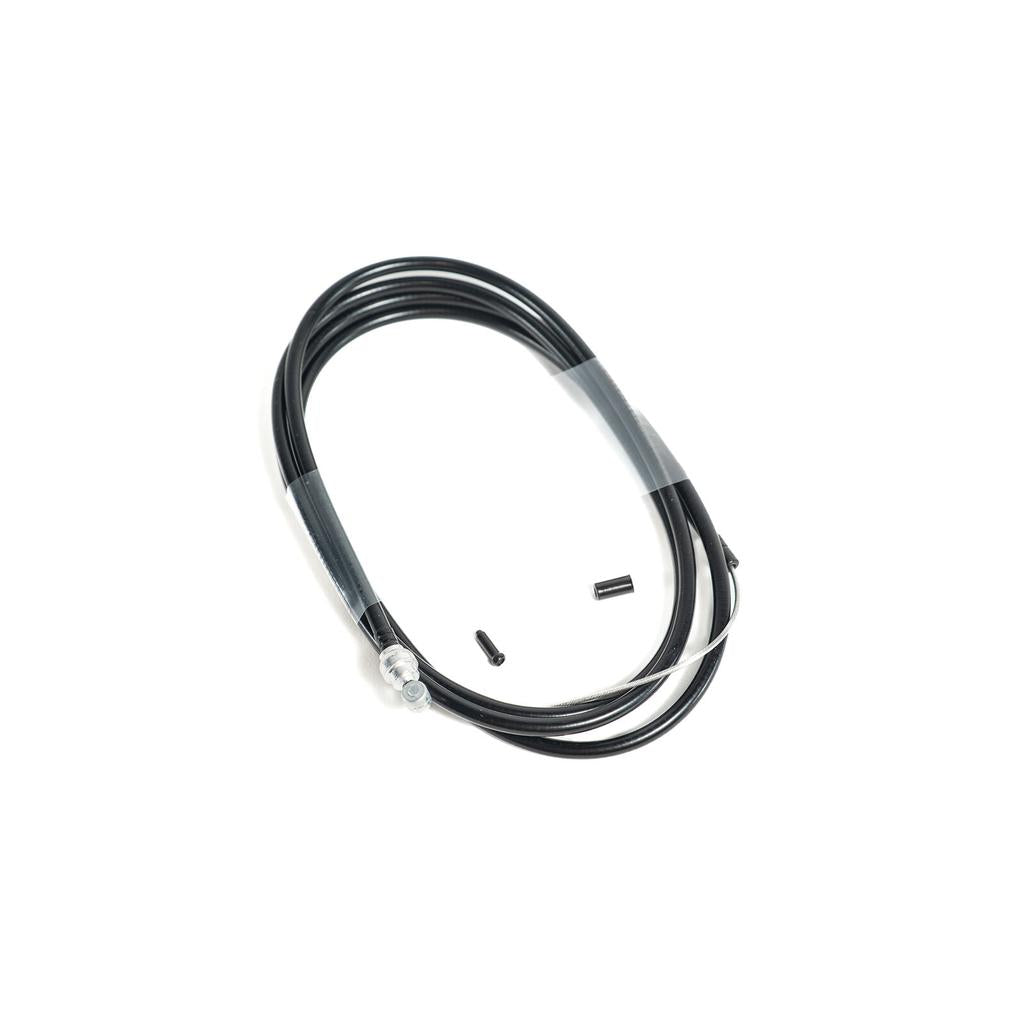 The Family Slick Brake Cable, featuring a coiled black design with braided stainless housing, metal end fitting, and two small black cylindrical pieces, is shown on a white background.
