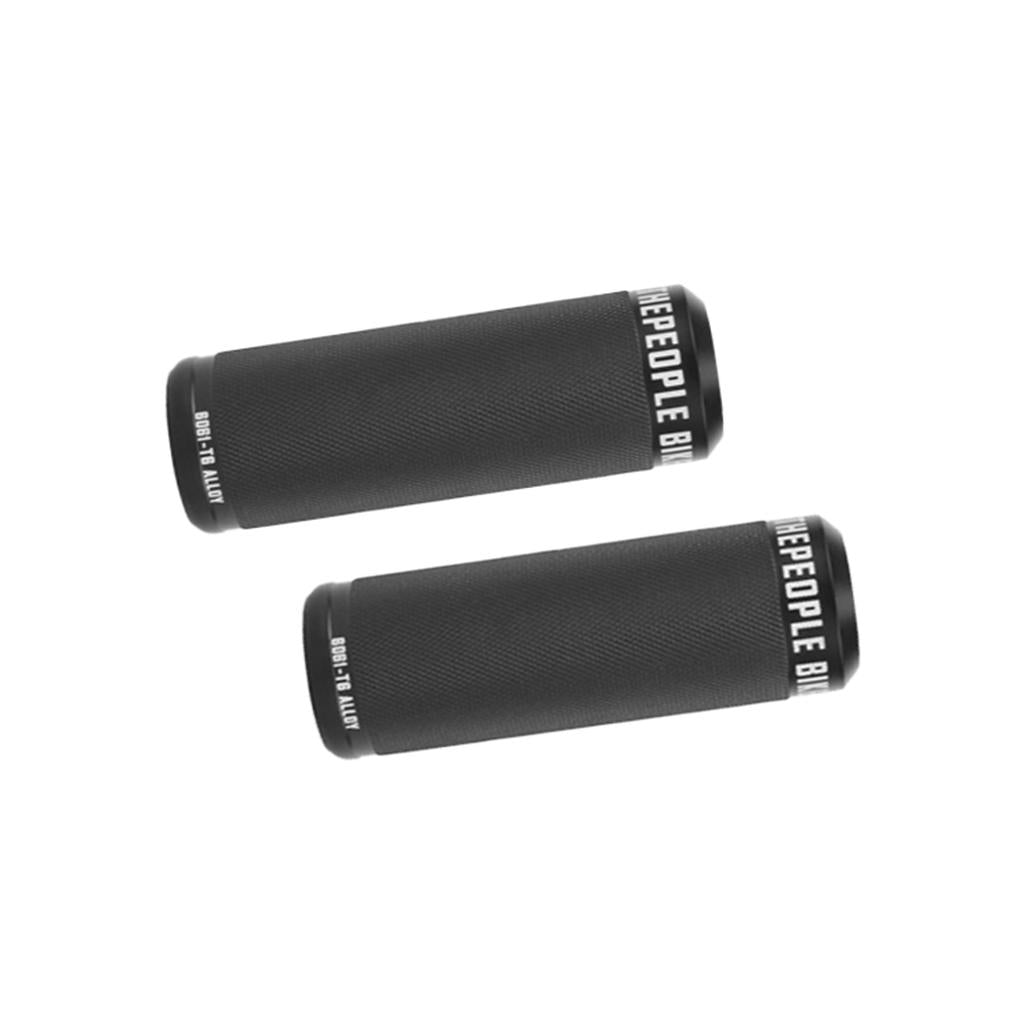 The Wethepeople Sinus Flatland Pegs (Pair) are lightweight black cylindrical BMX pegs with textured surfaces and "WETHEPEOPLE" branding, built for performance and style—ideal for flatland tricks. Shown diagonally on a white background.