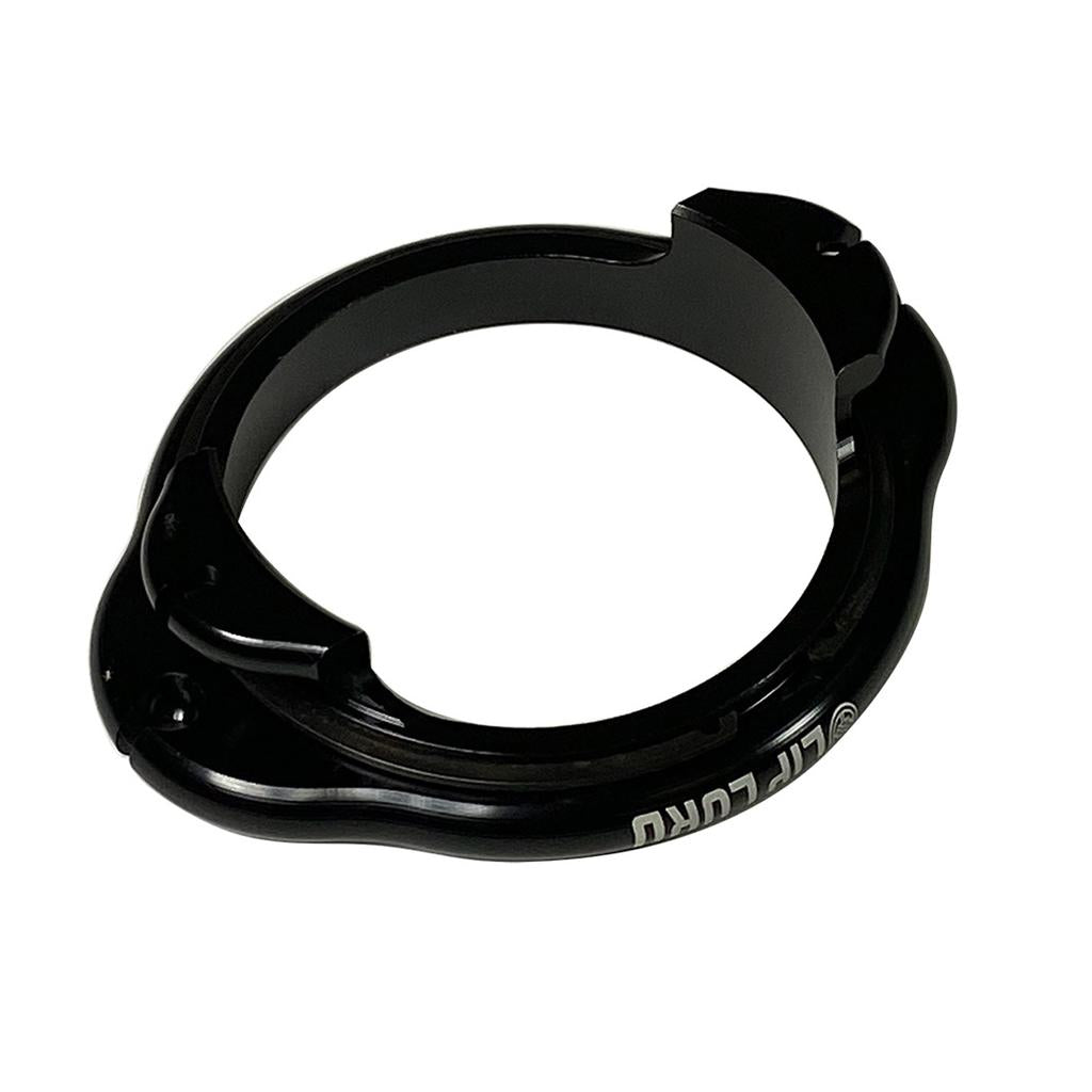 The S&M Lip Lord Mobeus Gyro Rotor is a black, circular clamp made of CNC-machined billet alloy with two raised notches and partially visible “LIFT LOCK” text, reminiscent of precision engineering in gyro or bearing systems.
