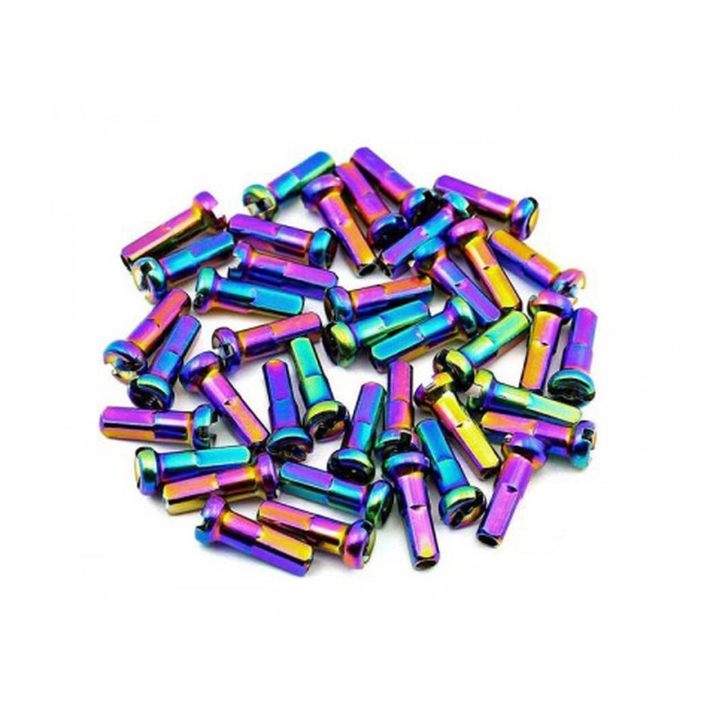 A pack of 36 MCS Nipples, metallic and rainbow-colored 14g steel spoke nipples, are arranged randomly on a white background.