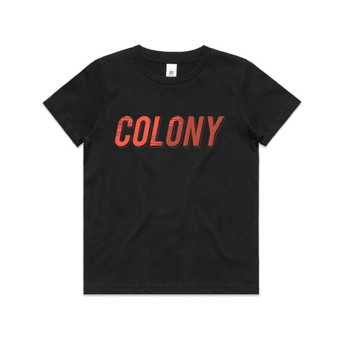 The Colony Momentum T-Shirt (Youth) is a black tee featuring "COLONY" in bold red letters across the chest, showcasing the iconic Australian BMX brand.
