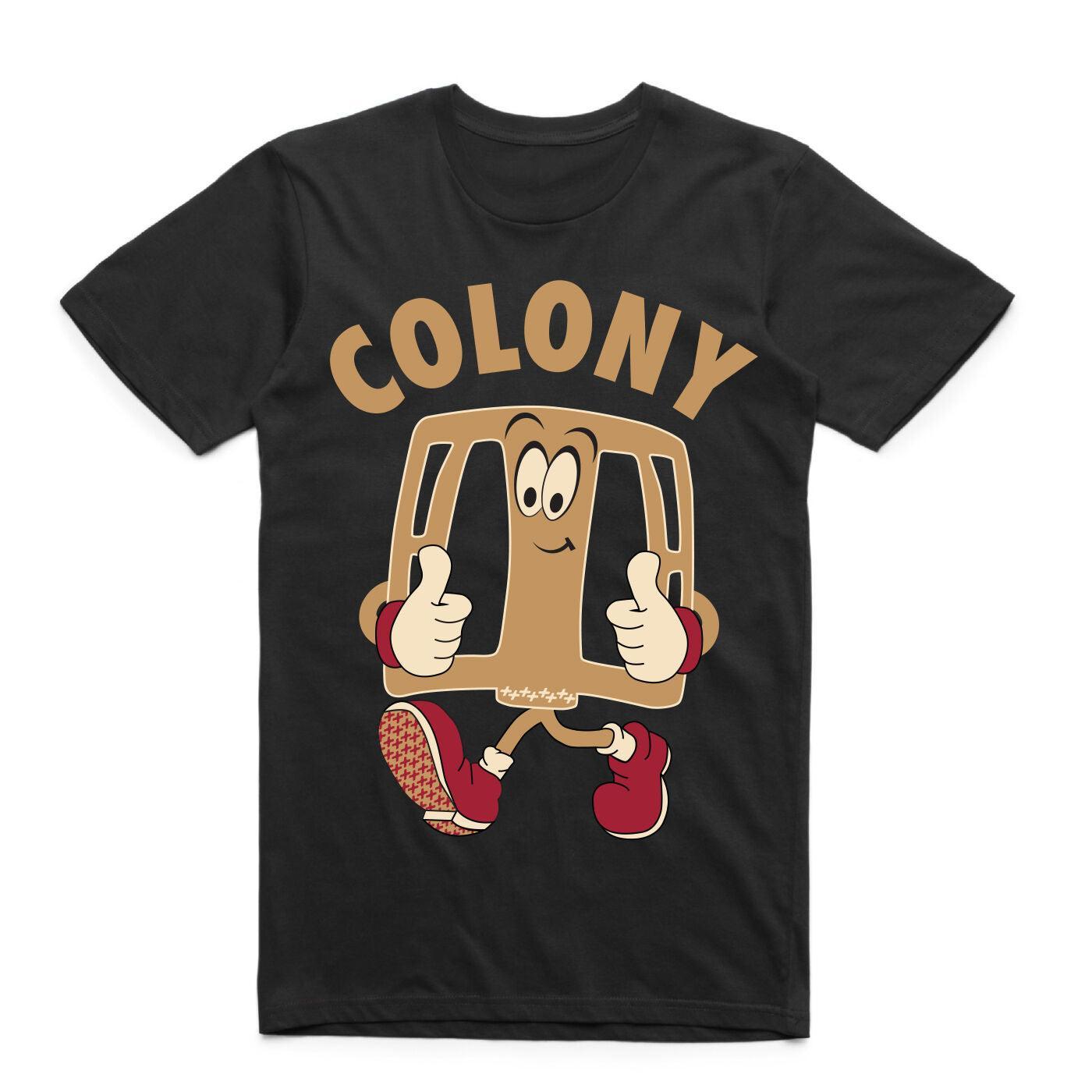 The Colony Pedal Man T-Shirt features a cartoon waffle character with arms, legs, and a smiling face giving two thumbs up under bold "COLONY" lettering. Made from 100% cotton for comfort—perfect for any BMX enthusiast.