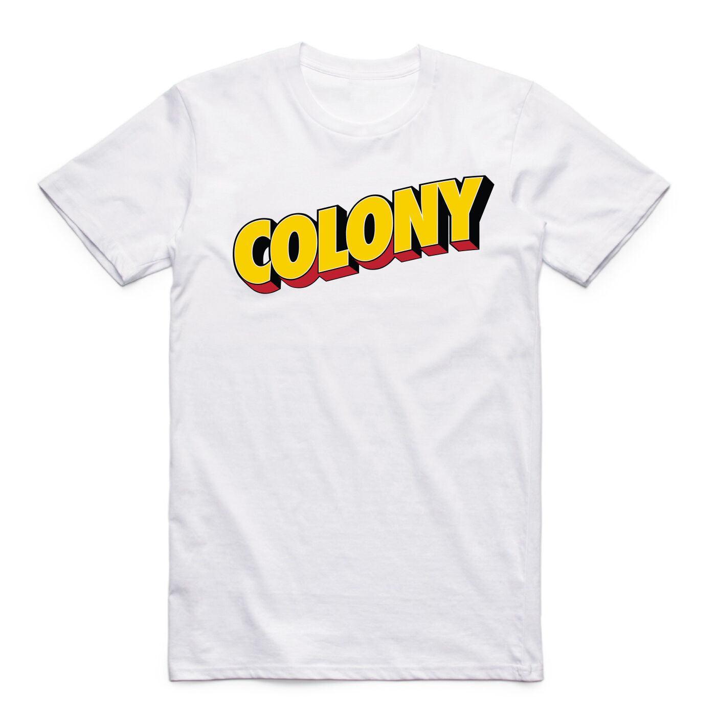 The Colony Postcard T-Shirt is a white tee featuring bold, yellow "COLONY" comic-style letters with black and red outlines across the chest—ideal for fans of the Aussie brand’s BMX travel lifestyle.