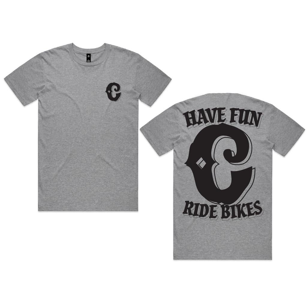 The Colony Have Fun T-Shirt is a gray BMX tee with a small black front "C" logo, bold “HAVE FUN RIDE BIKES” text, and a large back "C" logo—perfect for riders who love fun on their bikes.