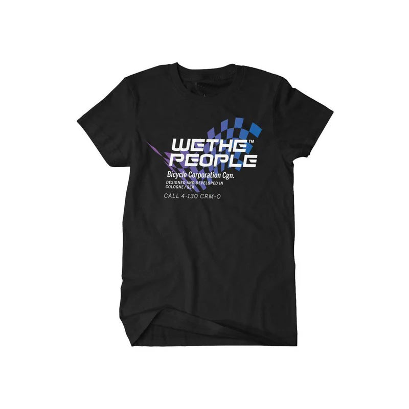 Wethepeople Daytona T-Shirt in black featuring "We The People" and "Bicycle Corporation Gen" printed in white and blue text on the front, alongside additional small text and a graphic of stylish overlapping blue and purple shapes.