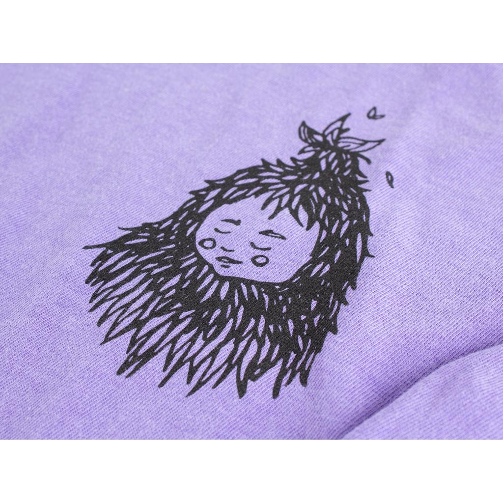 The Fairdale Nora V Long Sleeve T-Shirt features a black line drawing of a peaceful face with closed eyes and a leafy beard on lavender heavyweight cotton.
