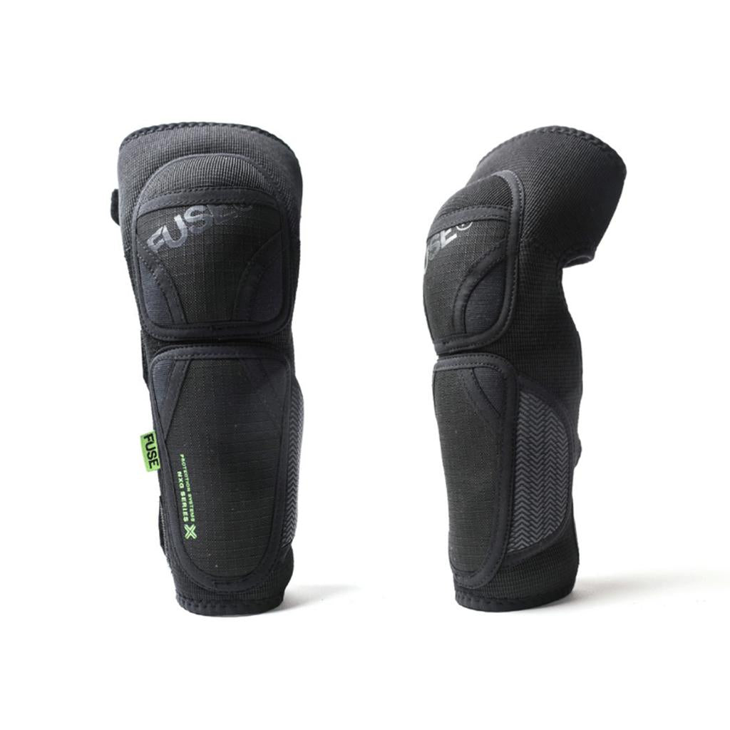 A pair of Fuse NXG Kids Knee Combo Pads, black with visible stitching and "FUSE" branding, stand upright on a white background. Ideal protective gear for kids, these pads offer enhanced safety for knees and shins.
