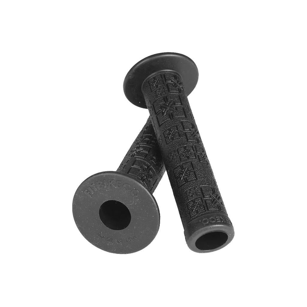 The Fit Bike Co Repeater Grips, featuring a black textured design and ODI-branded end caps, are showcased on a white background, ideal for cycling enthusiasts.